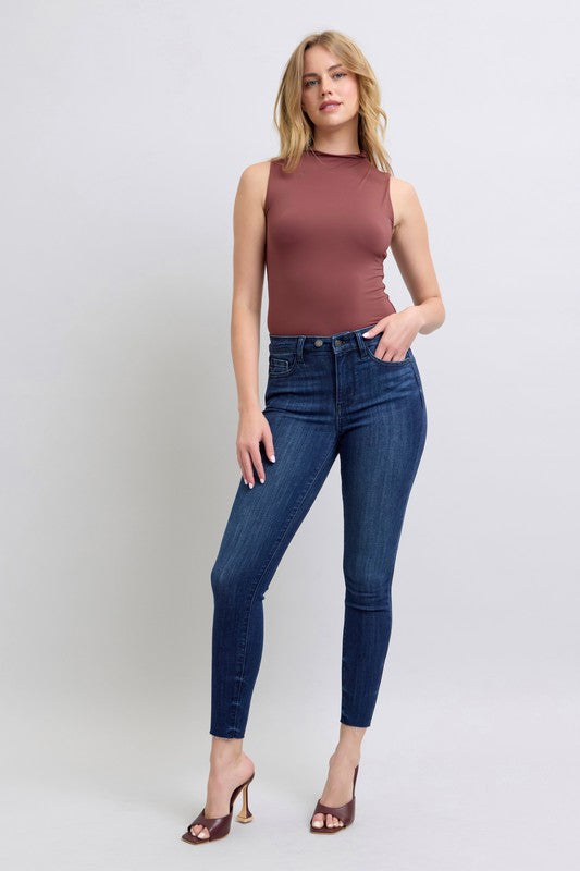 Mid Rise Double Button Raw Hem Skinny Jeans